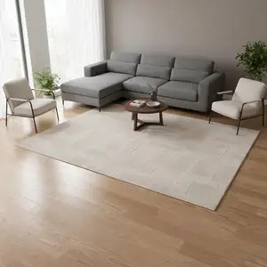 Photo of Cream And Ivory Geometric Area Rug