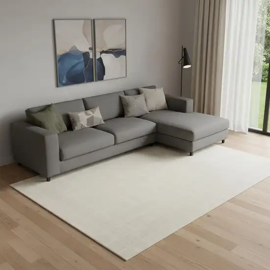 Cream And Ivory Geometric Area Rug Photo 1