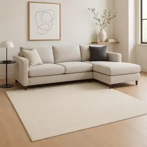 Photo of Cream And Ivory Geometric Area Rug
