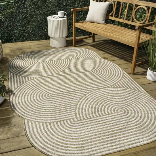 Cream And Natural Abstract Indoor Outdoor Area Rug Photo 8