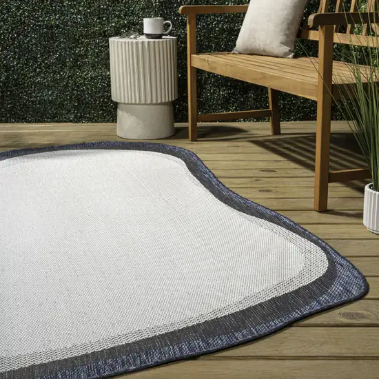 Cream And Navy Blue Abstract Indoor Outdoor Area Rug Photo 7
