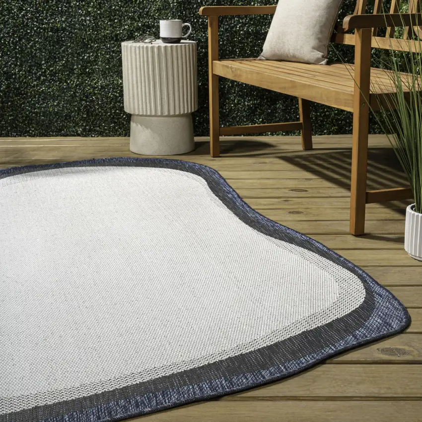 Cream And Navy Blue Abstract Indoor Outdoor Area Rug Photo 7