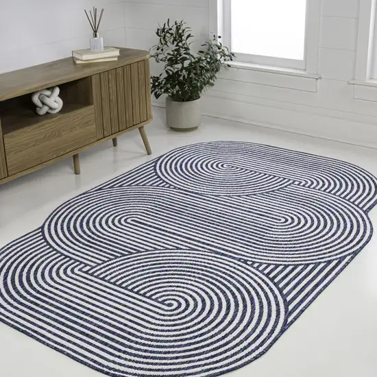 Cream And Navy Blue Abstract Indoor Outdoor Area Rug Photo 6