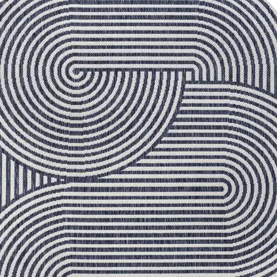 Cream And Navy Blue Abstract Indoor Outdoor Area Rug Photo 2