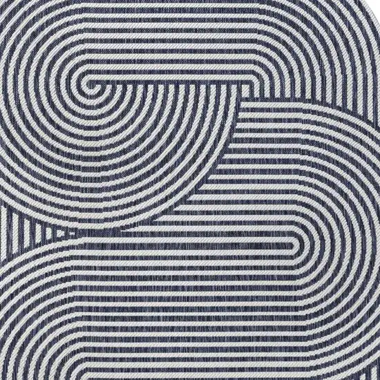 Cream And Navy Blue Abstract Indoor Outdoor Area Rug Photo 2