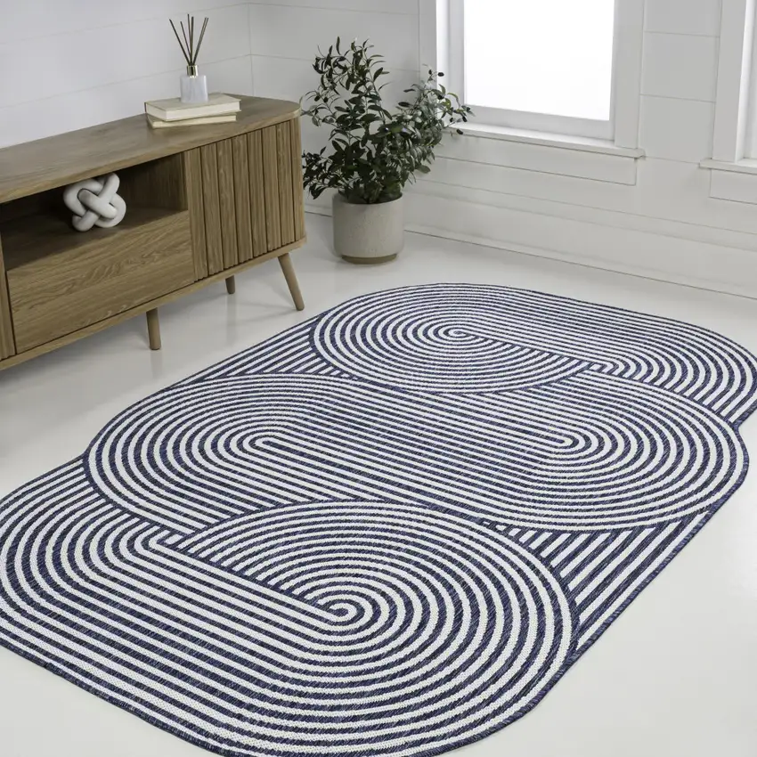 Cream And Navy Blue Abstract Indoor Outdoor Area Rug Photo 6