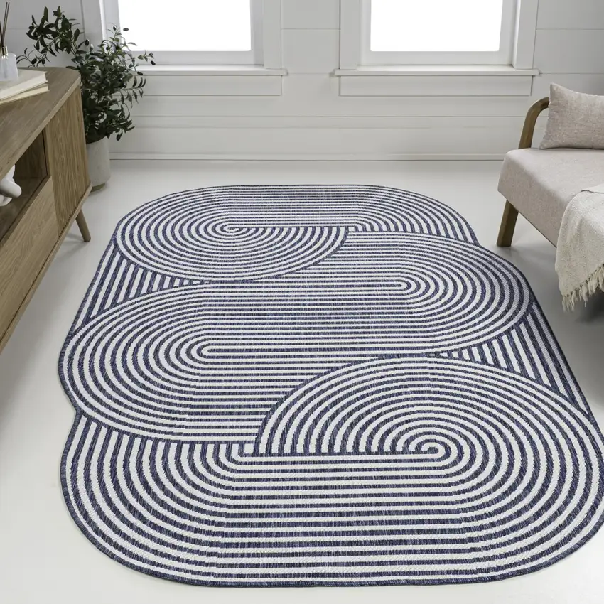 Cream And Navy Blue Abstract Indoor Outdoor Area Rug Photo 5