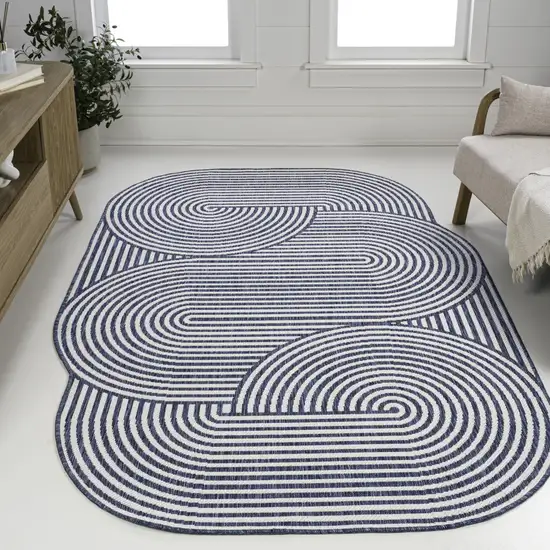 Cream And Navy Blue Abstract Indoor Outdoor Area Rug Photo 5