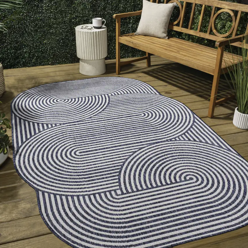 Cream And Navy Blue Abstract Indoor Outdoor Area Rug Photo 8