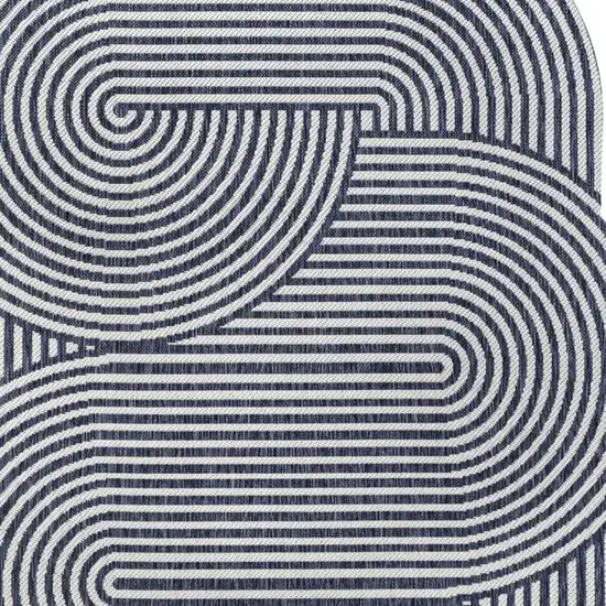 Cream And Navy Blue Abstract Indoor Outdoor Area Rug Photo 2