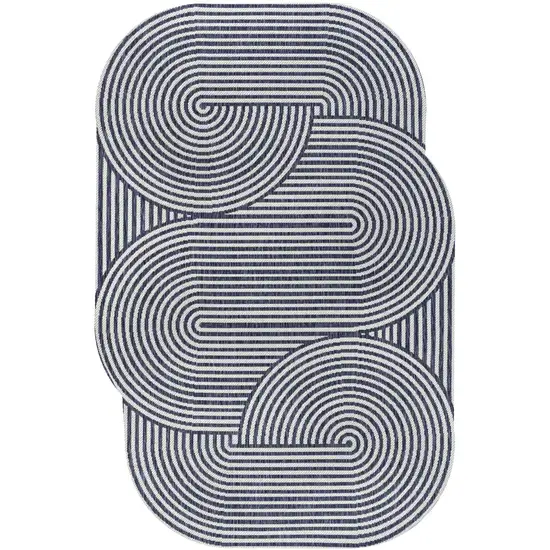 Cream And Navy Blue Abstract Indoor Outdoor Area Rug Photo 1