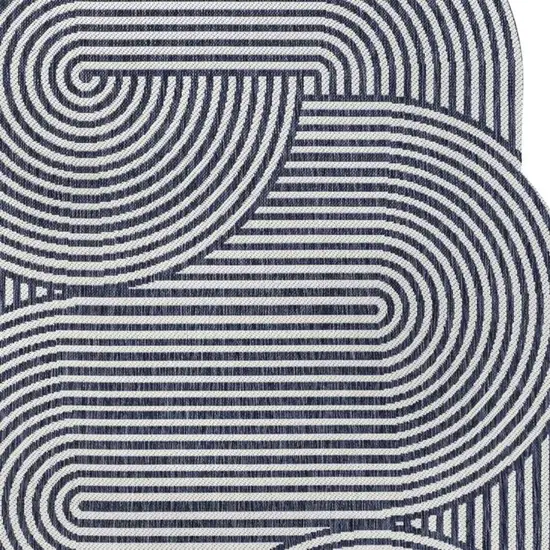 Cream And Navy Blue Abstract Indoor Outdoor Area Rug Photo 2