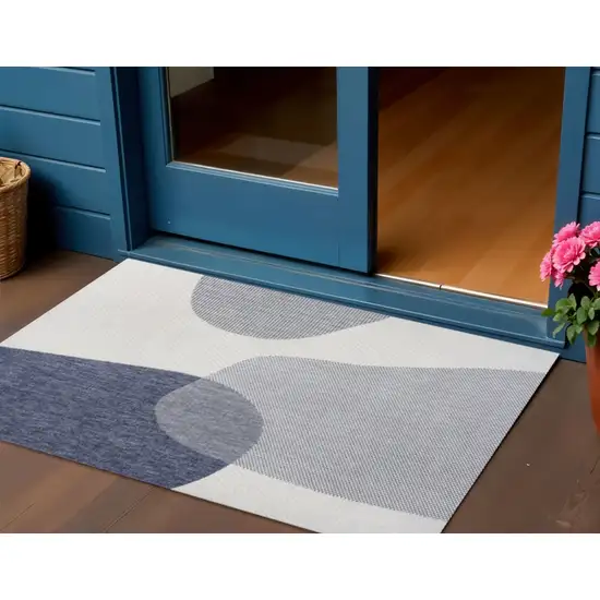 Cream And Navy Blue Geometric Indoor Outdoor Area Rug Photo 1