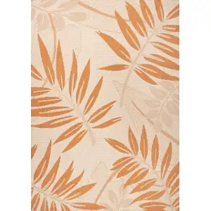 Photo of Cream And Orange Floral Indoor Outdoor Area Rug