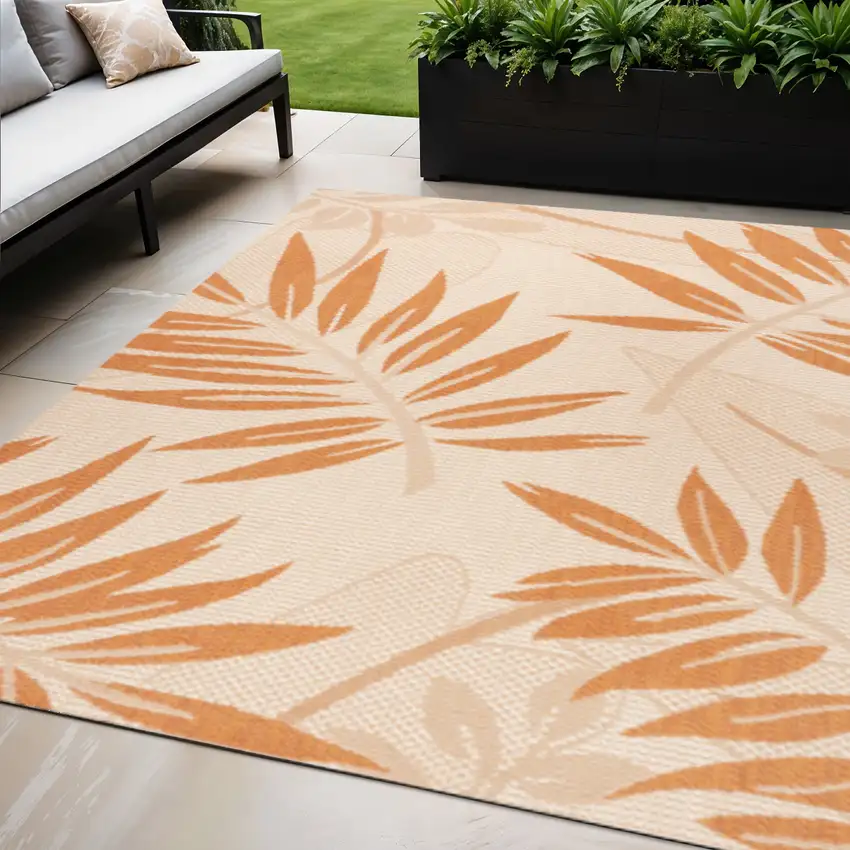 Cream And Orange Floral Indoor Outdoor Area Rug Photo 1