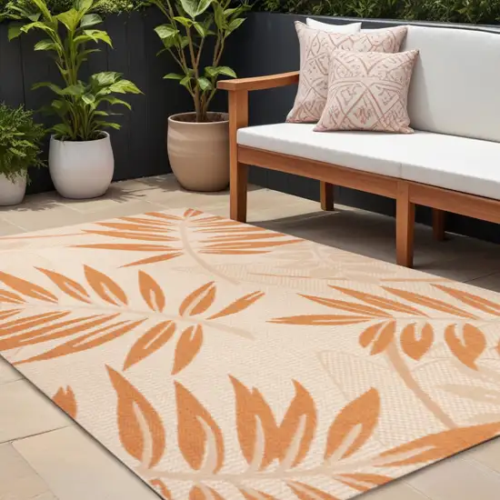 Cream And Orange Floral Indoor Outdoor Area Rug Photo 1