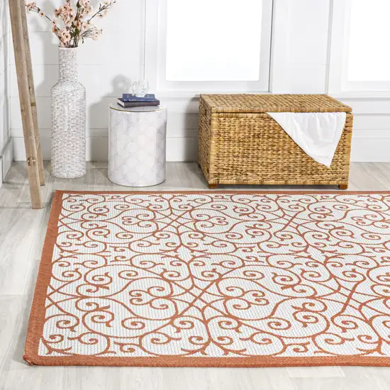 Cream And Orange Geometric Indoor Outdoor Area Rug Photo 6