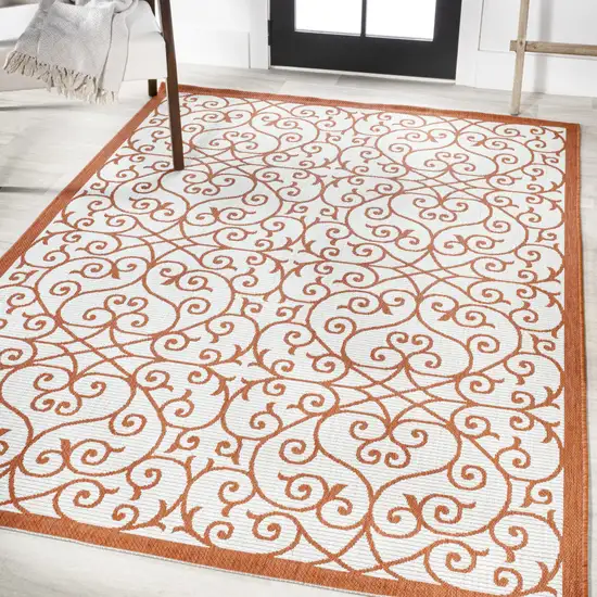 Cream And Orange Geometric Indoor Outdoor Area Rug Photo 5