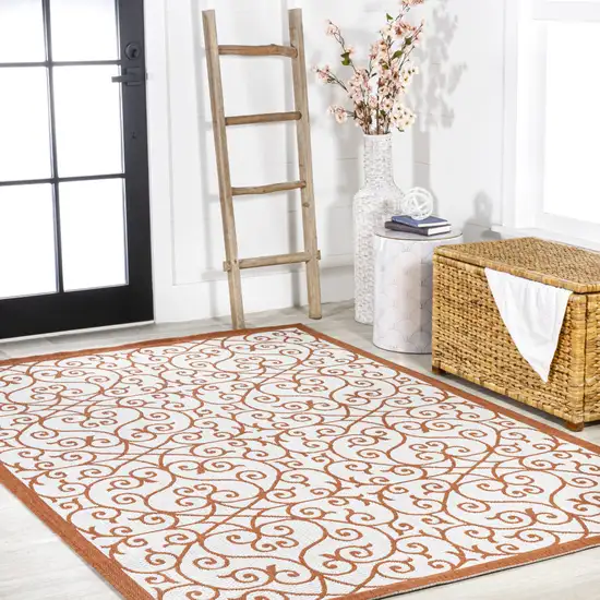 Cream And Orange Geometric Indoor Outdoor Area Rug Photo 8