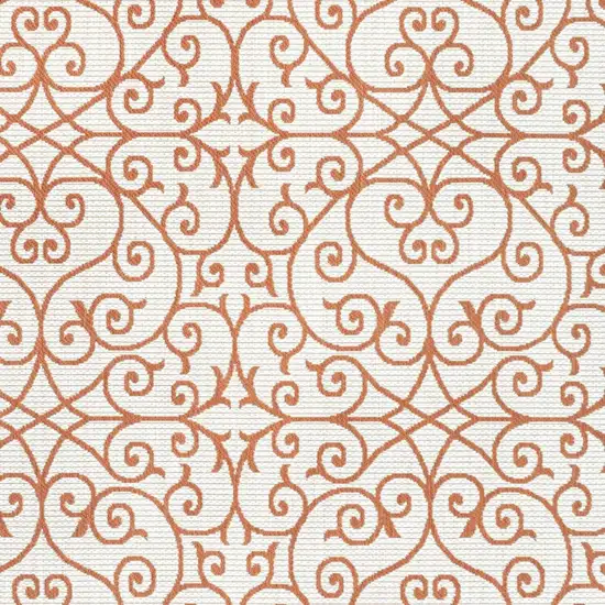 Cream And Orange Geometric Indoor Outdoor Area Rug Photo 2