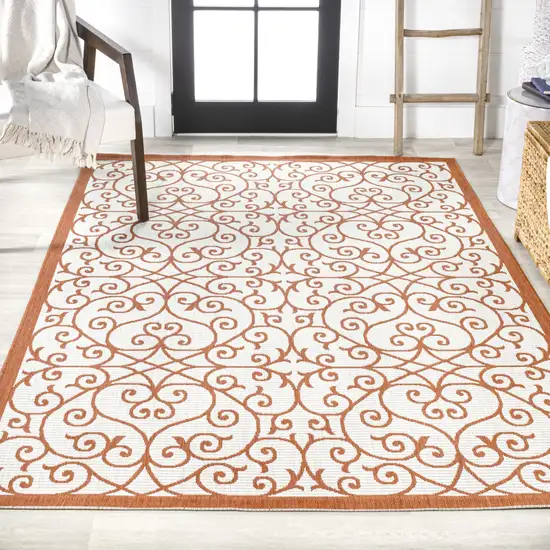 Cream And Orange Geometric Indoor Outdoor Area Rug Photo 7