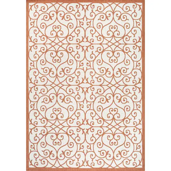 Cream And Orange Geometric Indoor Outdoor Area Rug Photo 1