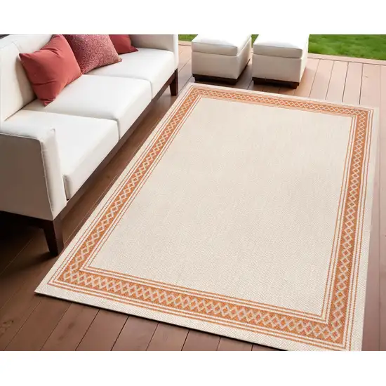 Cream And Orange Indoor Outdoor Area Rug Photo 1