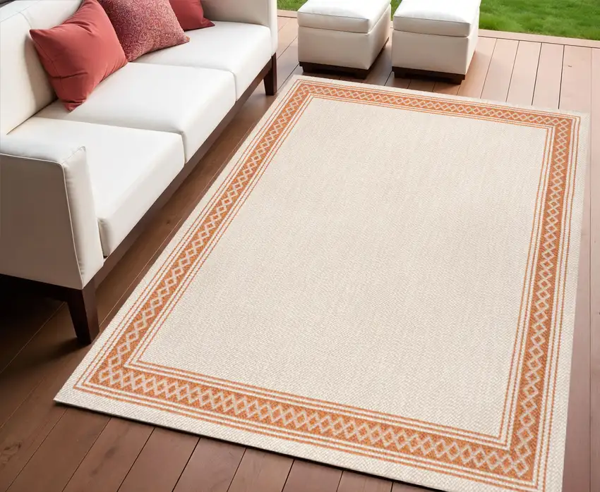 Cream And Orange Indoor Outdoor Area Rug Photo 1