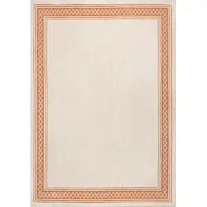 Photo of Cream And Orange Indoor Outdoor Area Rug