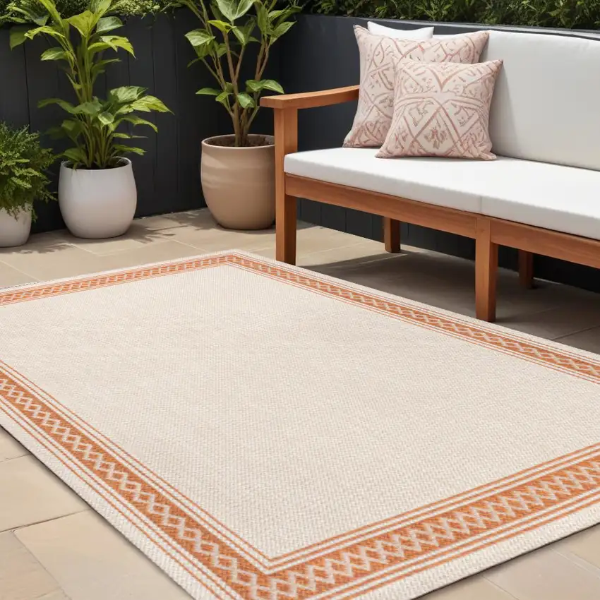 Cream And Orange Indoor Outdoor Area Rug Photo 1
