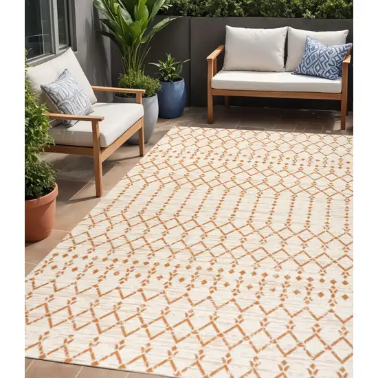 Cream And Orange Trellis Indoor Outdoor Area Rug Photo 1