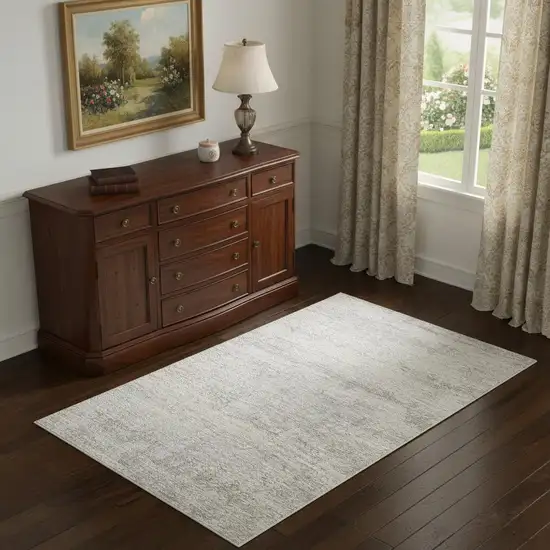 Cream And Silver Abstract Area Rug Photo 2