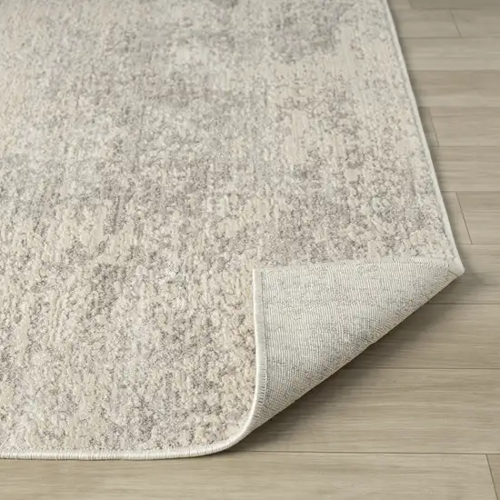 Cream And Silver Abstract Area Rug Photo 9