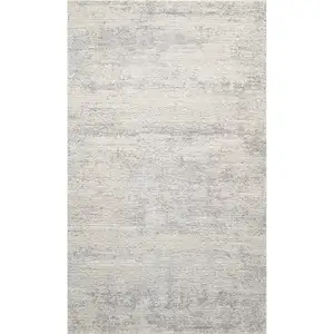 Photo of Cream And Silver Abstract Area Rug