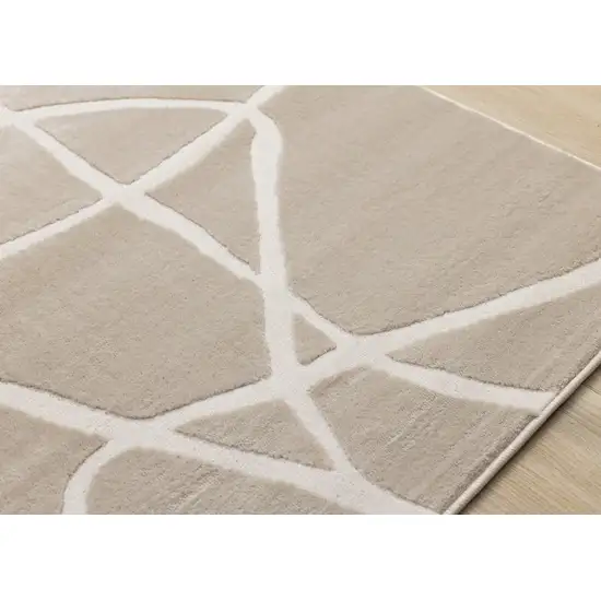 Cream And Tan Abstract Area Rug Photo 8