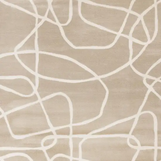 Cream And Tan Abstract Area Rug Photo 5