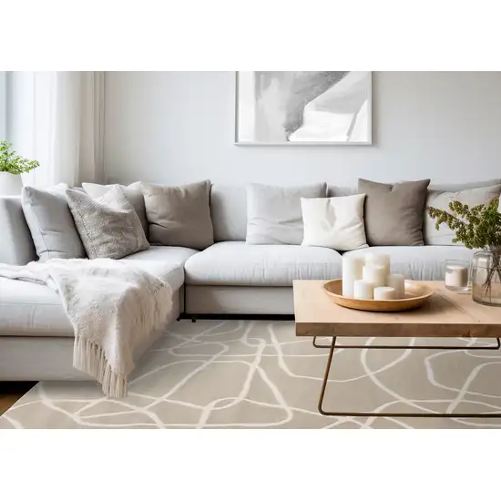 Cream And Tan Abstract Area Rug Photo 7