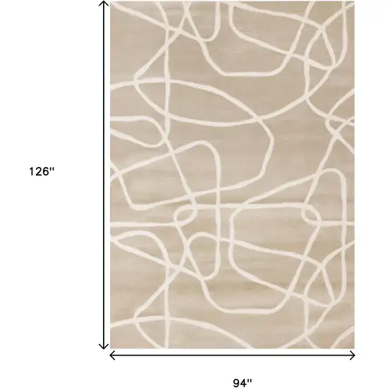 Cream And Tan Abstract Area Rug Photo 3