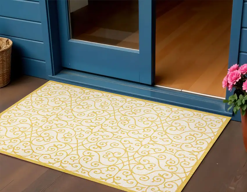 Cream And Yellow Geometric Indoor Outdoor Area Rug Photo 1