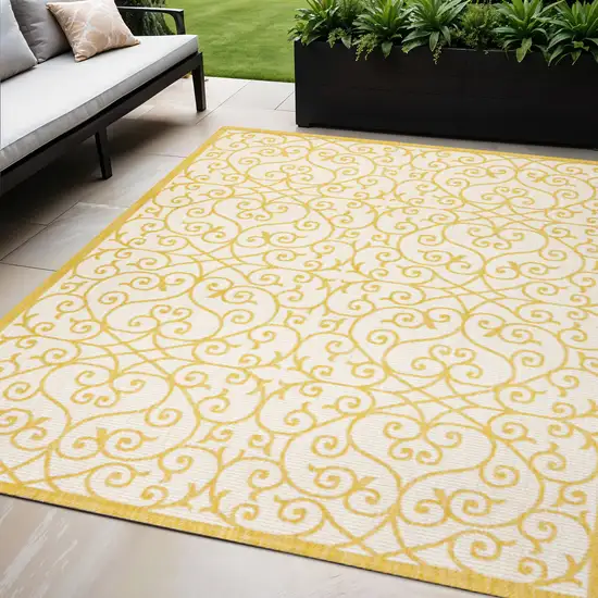 Cream And Yellow Geometric Indoor Outdoor Area Rug Photo 1