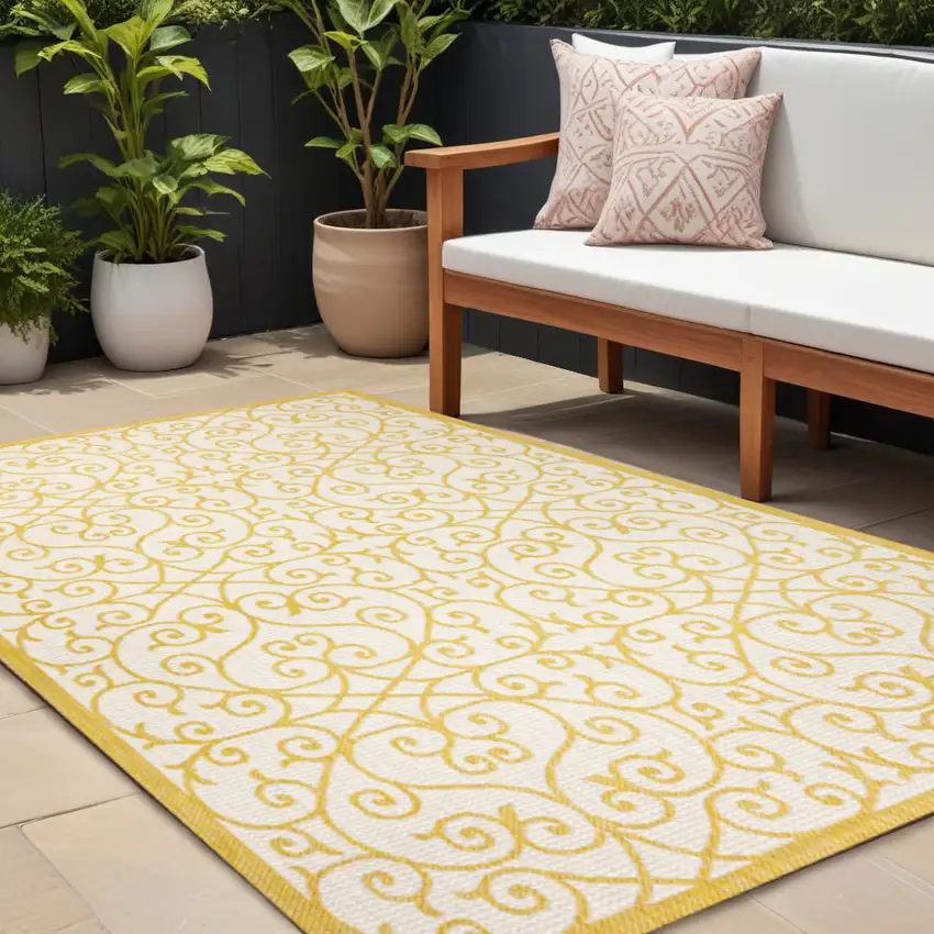 Cream And Yellow Geometric Indoor Outdoor Area Rug Photo 1