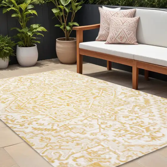 Cream And Yellow Medallion Indoor Outdoor Area Rug Photo 1