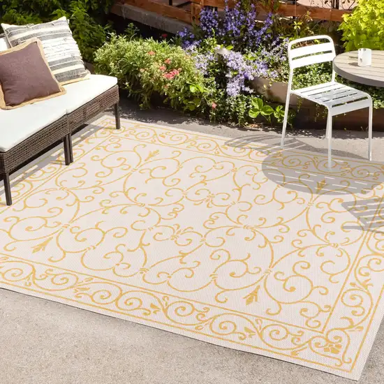 Cream And Yellow Medallion Indoor Outdoor Area Rug Photo 9