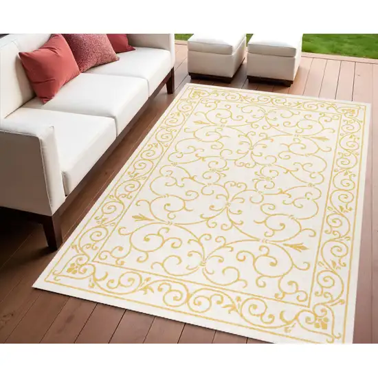 Cream And Yellow Medallion Indoor Outdoor Area Rug Photo 1