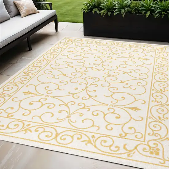 Cream And Yellow Medallion Indoor Outdoor Area Rug Photo 1