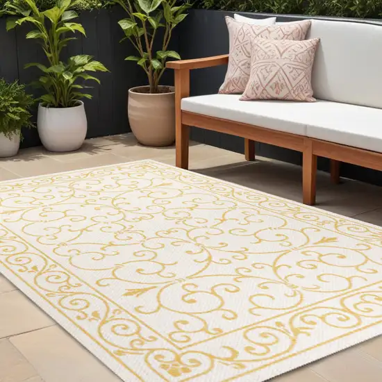 Cream And Yellow Medallion Indoor Outdoor Area Rug Photo 1