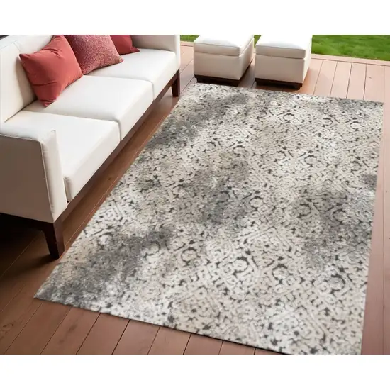 Cream Beige And Dark Gray Abstract Indoor Outdoor Area Rug Photo 1