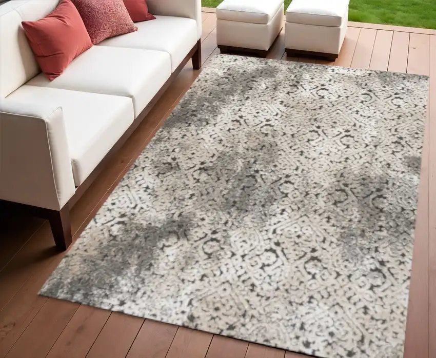 Cream Beige And Dark Gray Abstract Indoor Outdoor Area Rug Photo 1