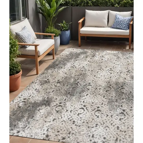 Cream Beige And Dark Gray Abstract Indoor Outdoor Area Rug Photo 1