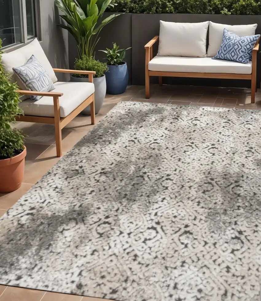 Cream Beige And Dark Gray Abstract Indoor Outdoor Area Rug Photo 1